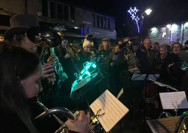 Carols: The band play in St Georges Square last Christmas Eve