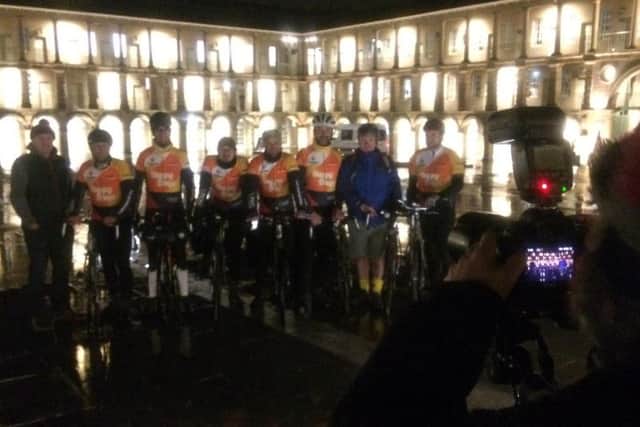 Triumphant riders have their photos taken at the Piece Hall.