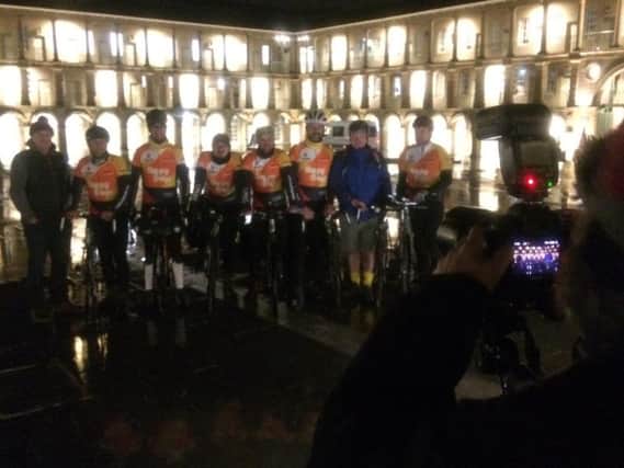 Triumphant riders have their photos taken at the Piece Hall.