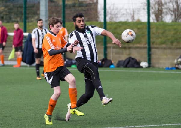 Actions from Halifax Hammers v King Cross, at Calderdale College. Pictured is Lee Taylor and Mohammed Ozair
