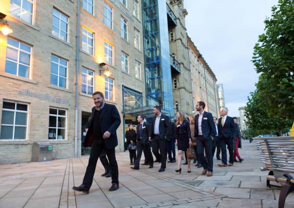 MD Jeremy Hall leads a Business for Calderdale tour of Dean Clough Mills, Halifax