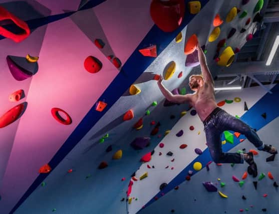 Date: 8th February 2018.
Picture James Hardisty.
Climbers can now enjoy an Olympic-class bouldering and training arena within the  ROKT Climbing Centre, of the Old Flour Mill, Brighouse. The new Â£100,000 facility stretches across the top two floors, featuring 1/4 km2 of curved and acutely angled bouldering walls, slabs, barrels and overhangs using the latest holds
and coatings. Pictured Brendan Dooher of ROKT (from Huddersfield) trying out the new  facility.