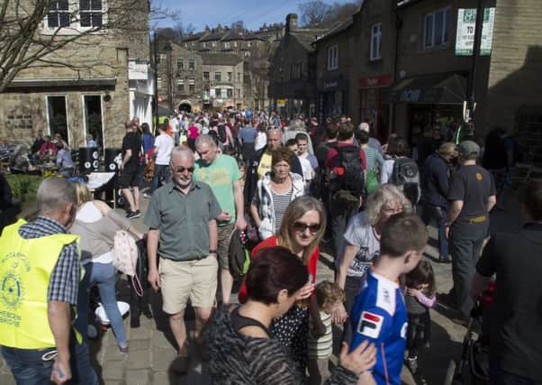 Tourists in town for the Rotary Club's Hebden Bridge Duck Race