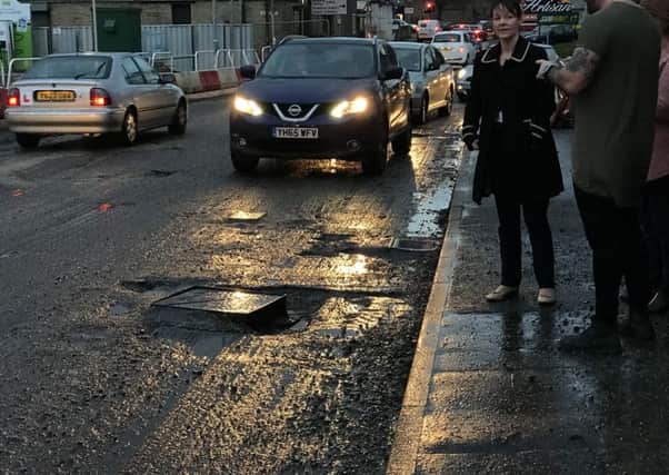 A pothole on Wakefield Road in Brighouse was left open during work the to street surface.