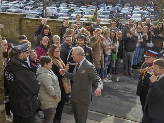 Prince Charles meets staff at Dean Clough in Halifax.