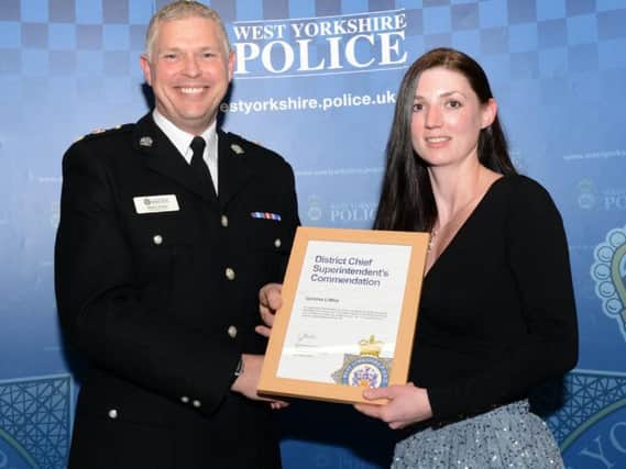 Gemma Littley receives her commendation from Chief Superintendent Steve Cotter