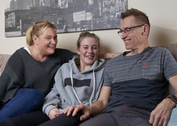 Gary Taylor (right) with daughter Bethany and wife Colette.