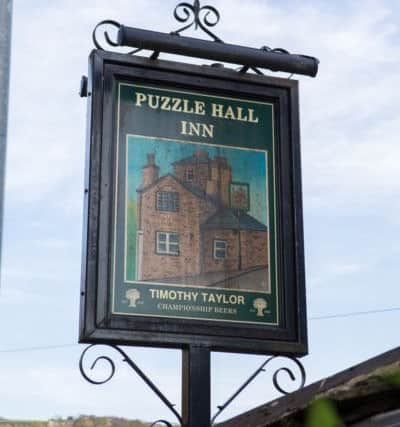 Puzzle Hall Community Pub supporters celebrate buying the historic Puzzle Hall Inn, Hollins Lane, Sowerby Bridge