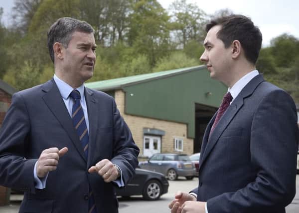 Justice Secretary David Gauke at Brighouse with Jacob Hill of Offploy.
