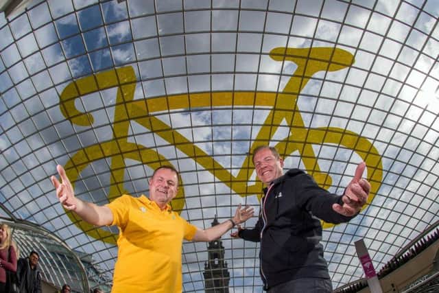 The largest ever Tour de Yorkshire 'Yellow Bike' officially unveiled at Trinity Leeds the eye-catching 31 metre wide bike adorns the glass dome roof of the shopping centre.