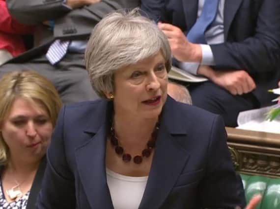Prime Minister Theresa May defended her Transport Secretary Chris Grayling under fire from Halifax MP Holly Lynch.