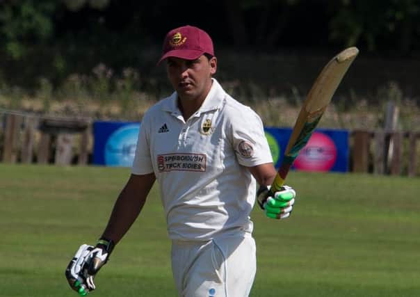 Actions from Lightcliffe v Saltaire, at Lightcliffe CC. Pictured is Suleman Khan celebrating 100