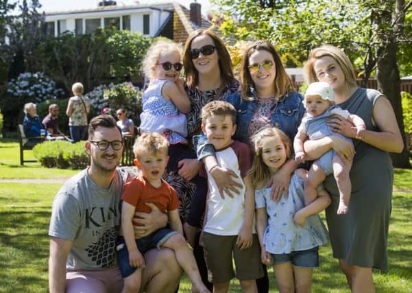 Overgate Hospice Garden Party, Elland. From the left, Dan Aspinall with Oliver Aspinall, three, Savannah Tait, four, with Gemma Graham, Thomas Collins, eight, Jemma Carroll, Lily Collins, five,and Louie Aspinall, six months, with Rebecca Aspinall.