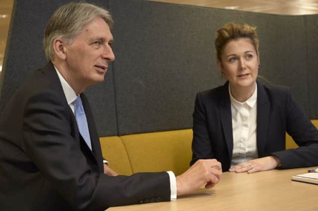 Chancellor Philip Hammond at Lloyds Banking Group, Halifax with Katie Green.