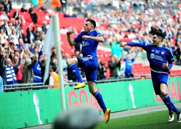 The FA Trophy Final.
FC Halifax v Grimsby Town.
Halifax's scott McManus celebrates his winning goal.
22nd May 2016.
Picture : Jonathan Gawthorpe