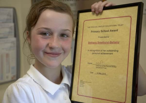 Bethany Smethurst Bellamy with her award from the Percival Whitley Trust.