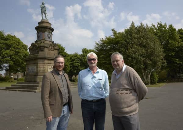 Ian Hey with Counciollors James Baker and Ashley Evans at Boer War Memorial in West View Park, Halifax.