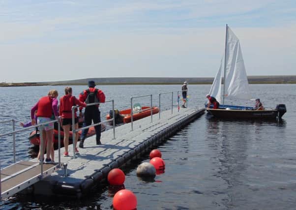 Vital facility: Halifax Sailing Clubs new floating jetty at Warley Moor Reservoir.