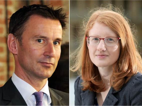 Health Secretary Jeremy Hunt, left, and Halifax MP Holly Lynch